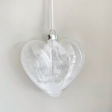 “Feathers appear when angels are near” glass heart