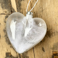 “Feathers appear when angels are near” glass heart
