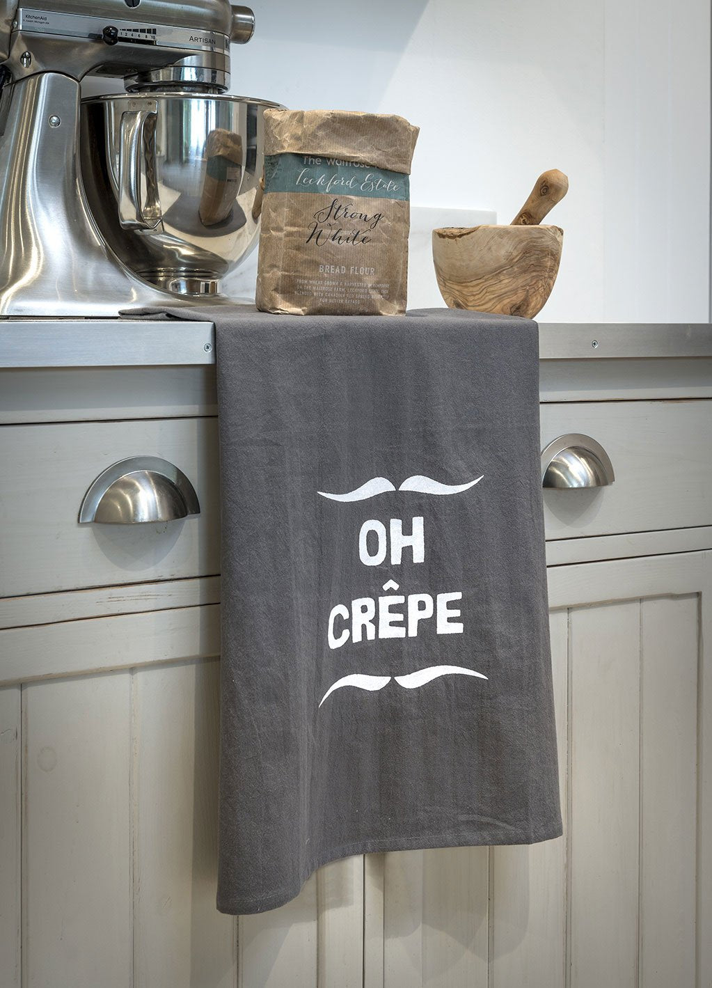 ‘Oh crepe’ slogan tea towel