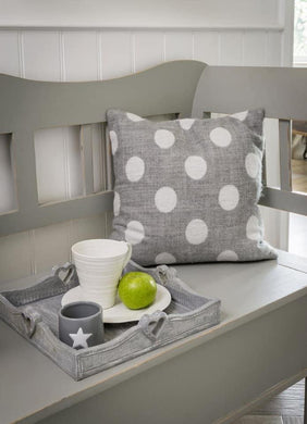 Grey/ white spot cushions.