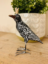 Wooden carved crowned bird